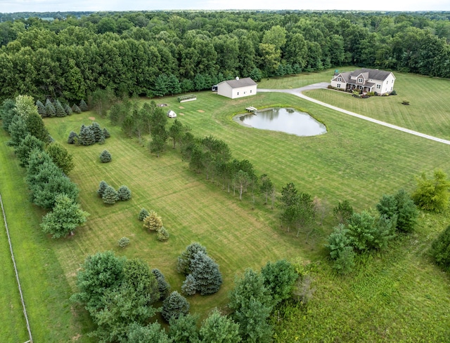 birds eye view of property featuring a rural view and a water view