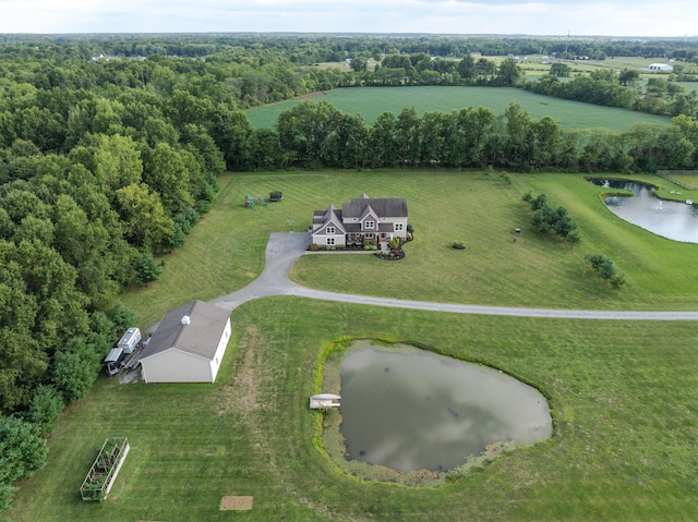 aerial view with a water view and a rural view