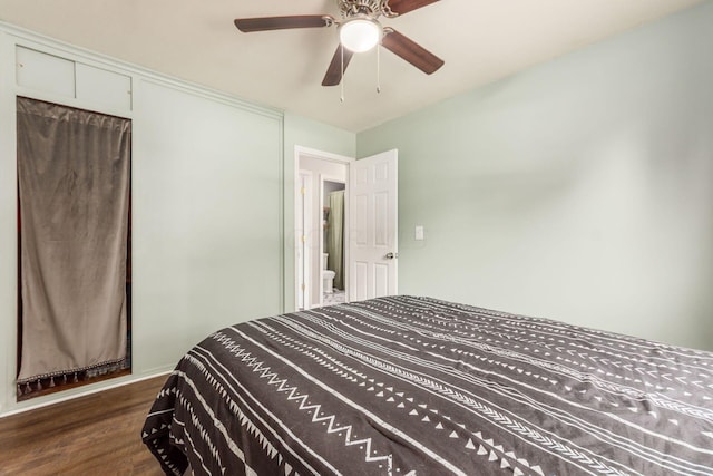 bedroom featuring ceiling fan and dark hardwood / wood-style flooring