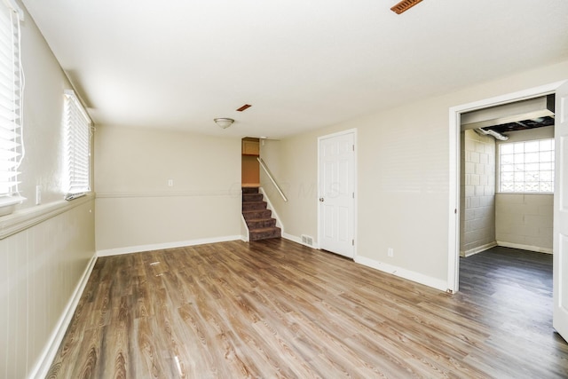 unfurnished room with light hardwood / wood-style floors