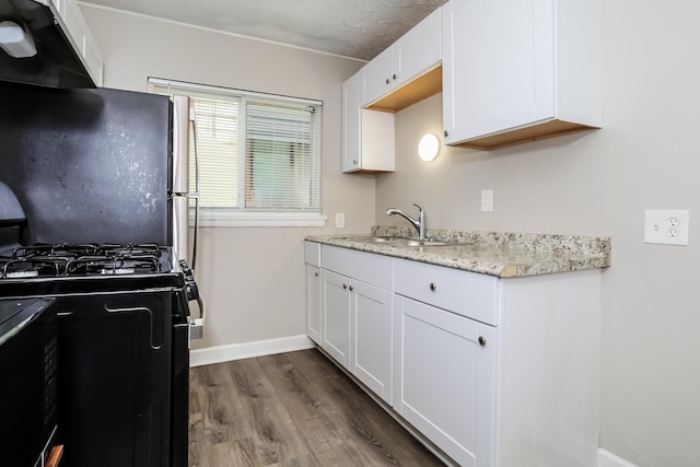 kitchen with black appliances, ventilation hood, sink, dark hardwood / wood-style flooring, and white cabinetry