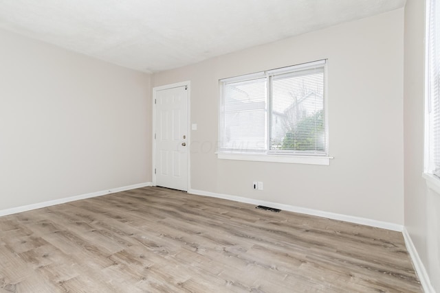 empty room featuring light wood-type flooring