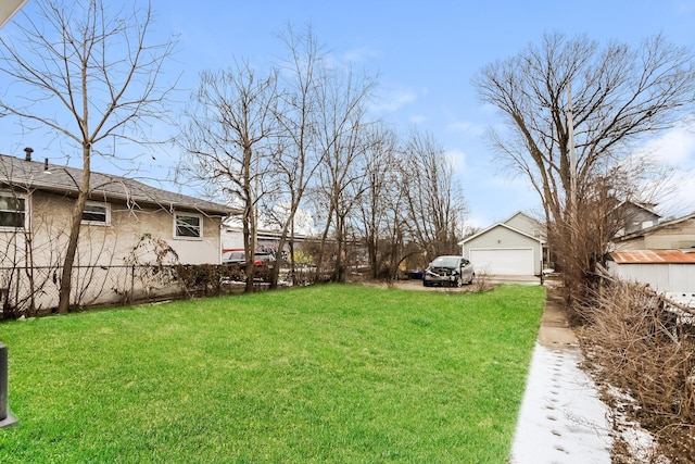 view of yard with a garage