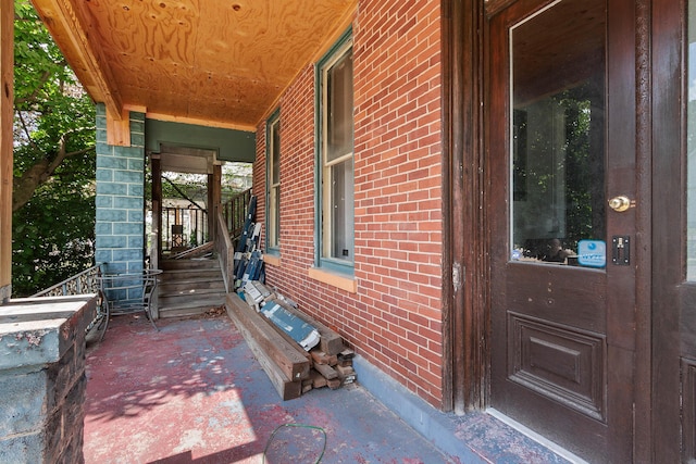 entrance to property with a porch