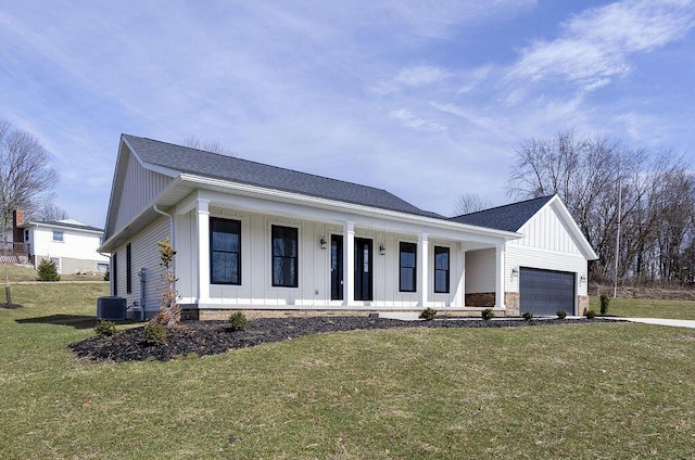 modern inspired farmhouse featuring a porch, an attached garage, central air condition unit, board and batten siding, and a front yard