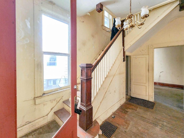 staircase featuring a healthy amount of sunlight