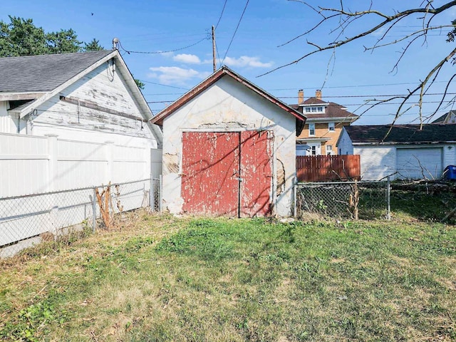 view of outdoor structure with a lawn