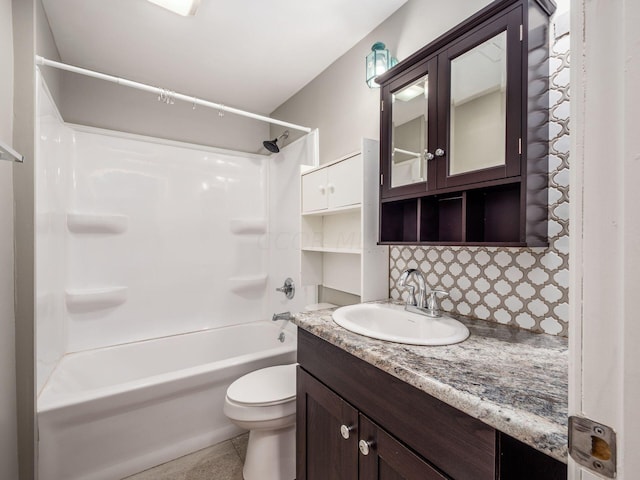 full bathroom with tasteful backsplash, tile patterned flooring, toilet, vanity, and shower / bathtub combination