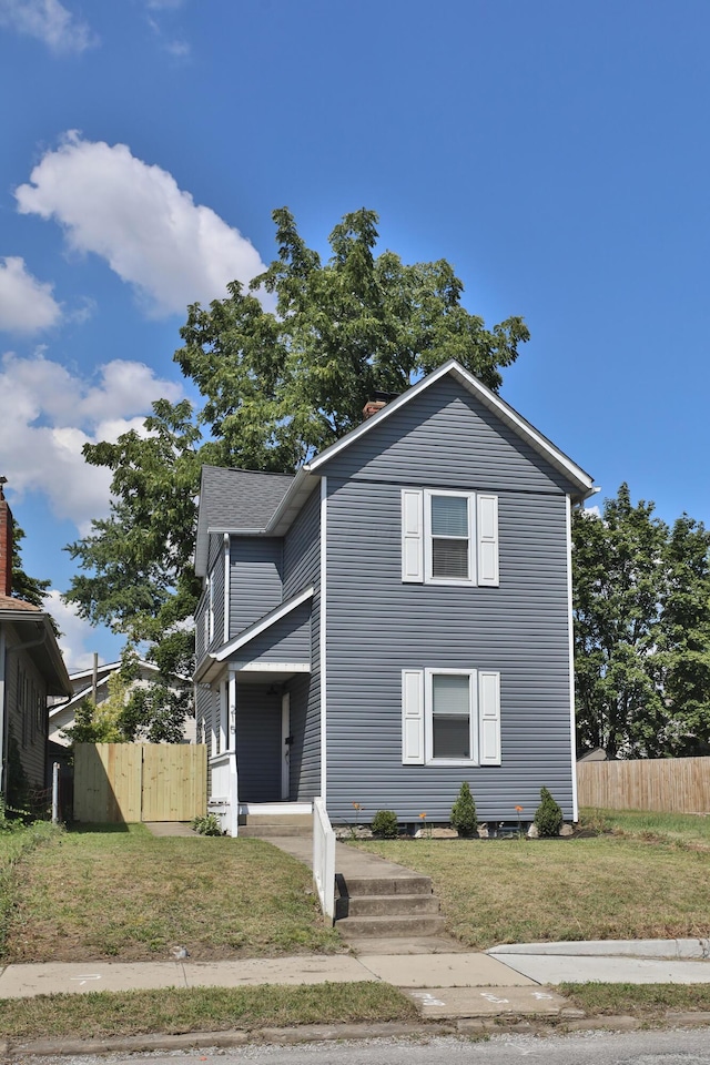 view of front property with a front yard