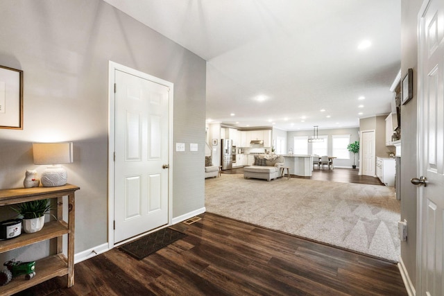 living room featuring dark wood-type flooring