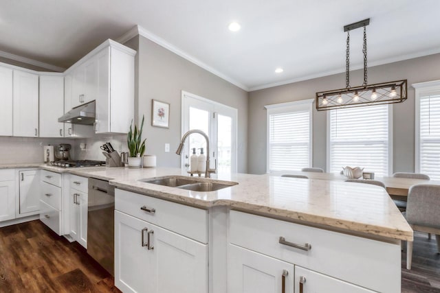 kitchen with white cabinets, stainless steel appliances, a healthy amount of sunlight, and sink