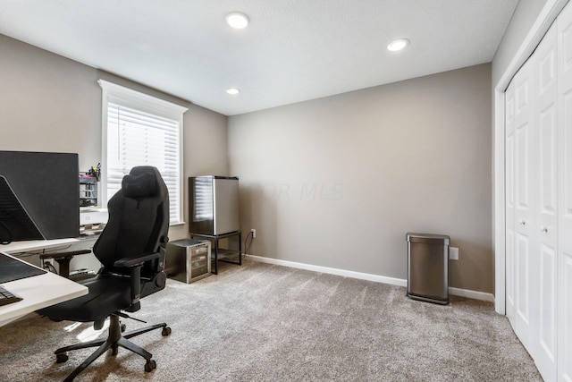 view of carpeted office space