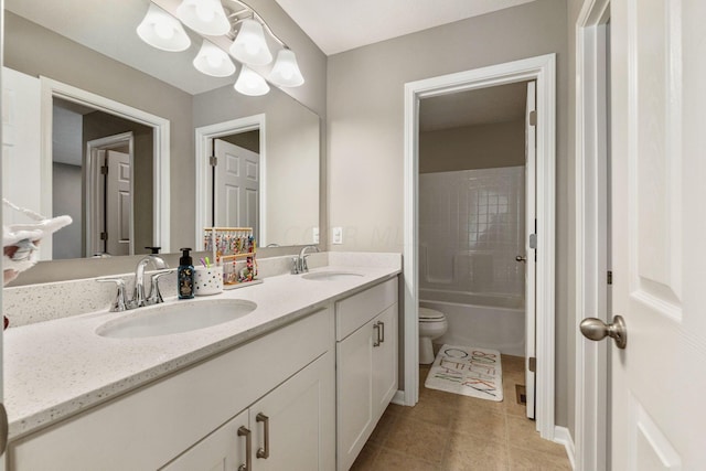 full bathroom featuring bathing tub / shower combination, tile patterned flooring, vanity, and toilet