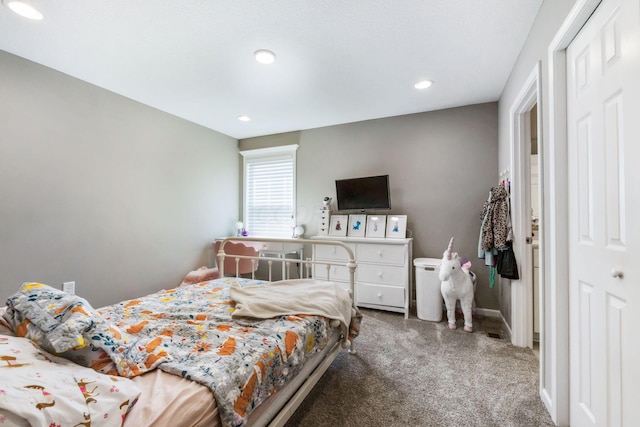 bedroom with a closet and carpet