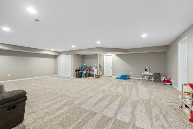 recreation room featuring carpet flooring