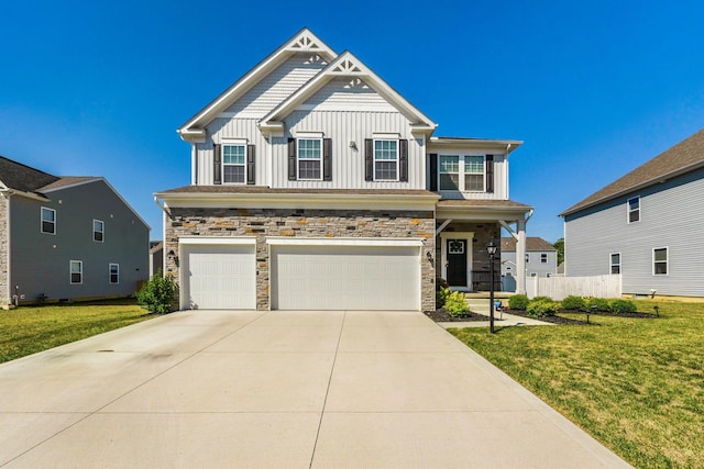 view of front of home with a garage and a front yard