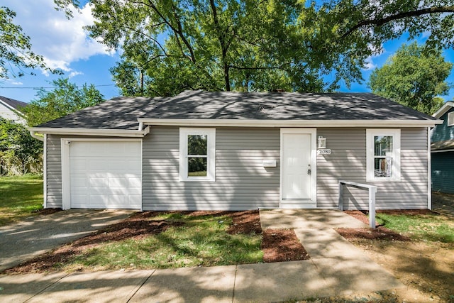 single story home with a garage