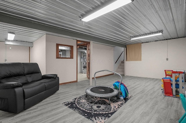 recreation room featuring light hardwood / wood-style floors