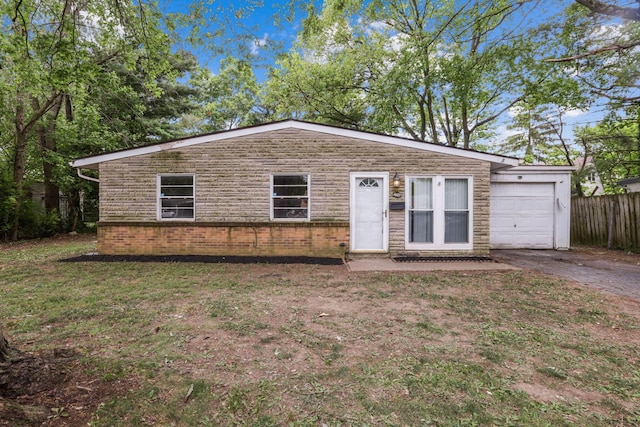 single story home with a garage