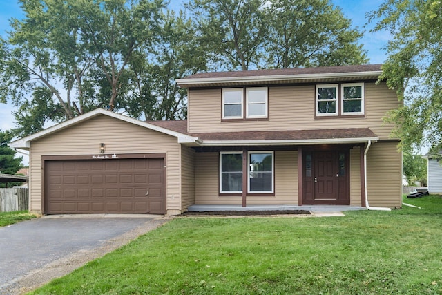 view of front property with a front yard, a porch, and a garage