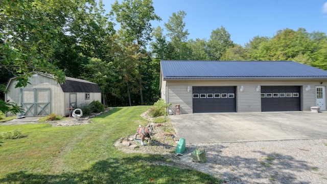 garage featuring a yard