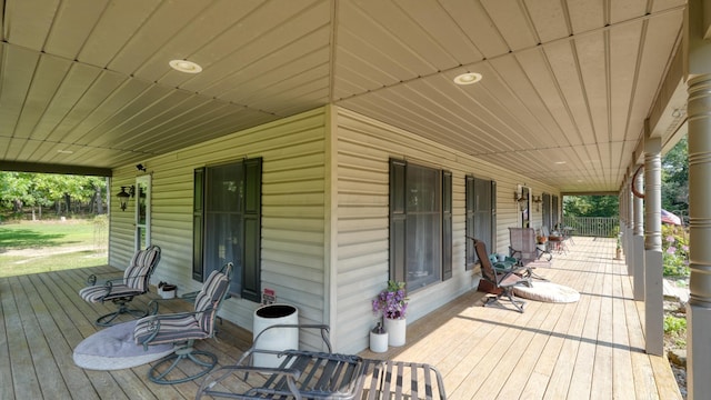 wooden terrace featuring a porch