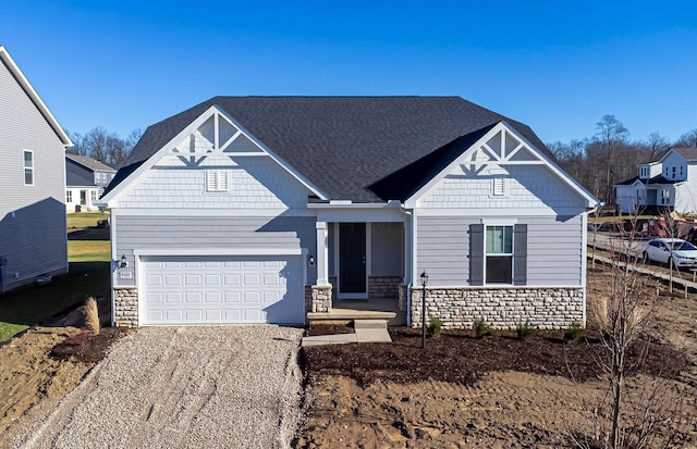 craftsman-style house featuring a garage