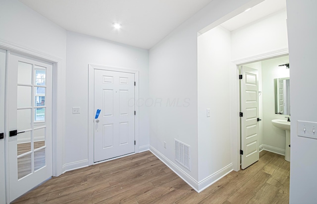 entrance foyer featuring light hardwood / wood-style flooring