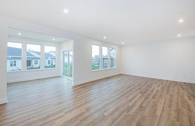 interior space with a wealth of natural light and light wood-type flooring