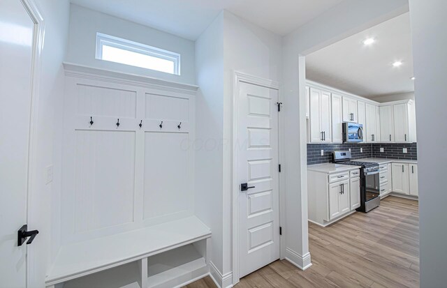 mudroom with light wood-type flooring