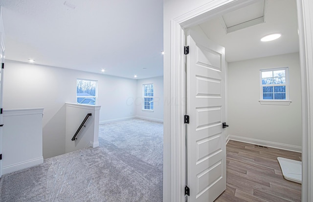 corridor featuring hardwood / wood-style flooring