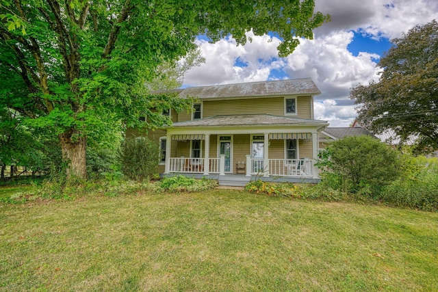 view of front of home with a front lawn and a porch