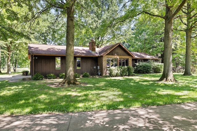 ranch-style house with a front yard