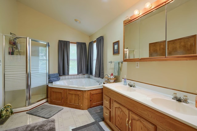 bathroom featuring vanity, lofted ceiling, and plus walk in shower