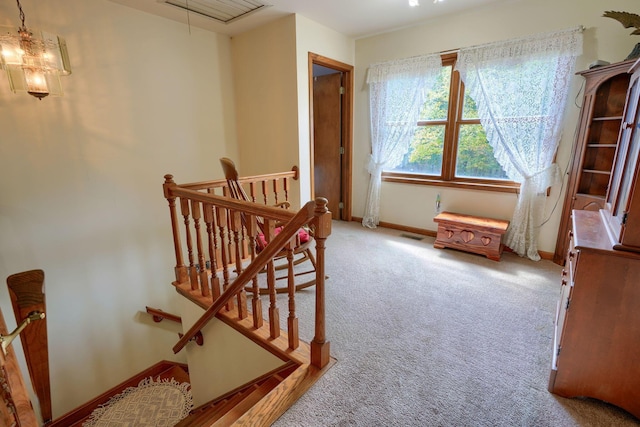 living area with light carpet