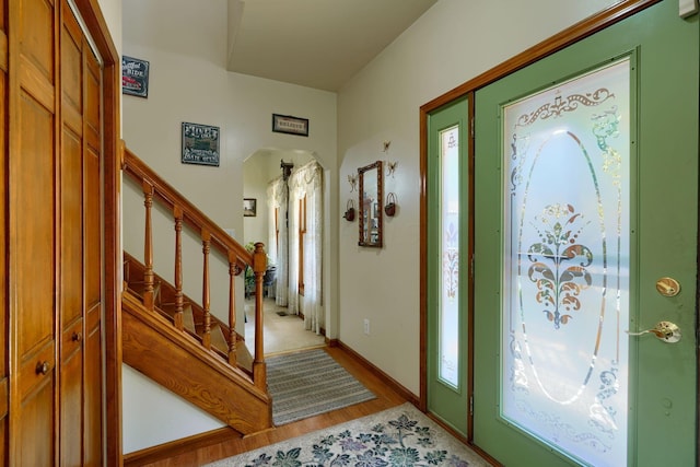 foyer with light hardwood / wood-style flooring