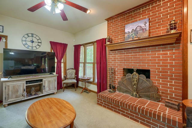 living room with ceiling fan, a fireplace, and carpet floors