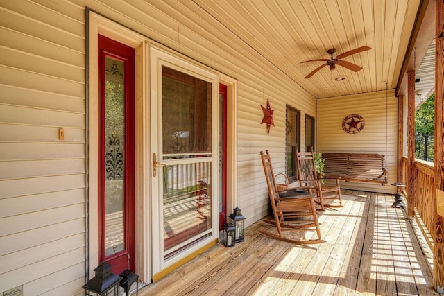 exterior space featuring a porch and ceiling fan