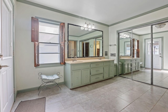 bathroom featuring tile patterned floors, vanity, and ornamental molding