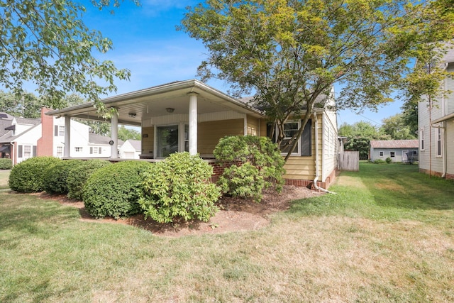 exterior space featuring a front yard