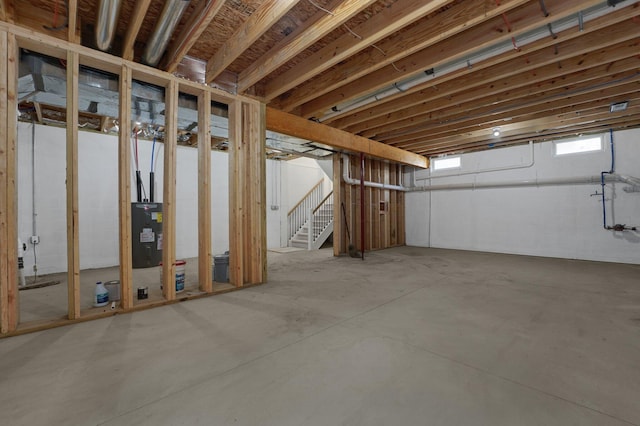 basement featuring electric water heater