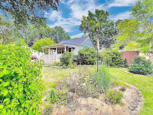 view of yard featuring a porch