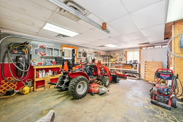 garage with a workshop area