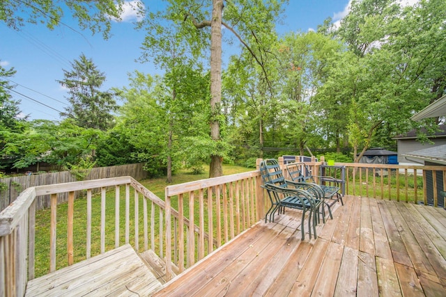 wooden deck with a yard