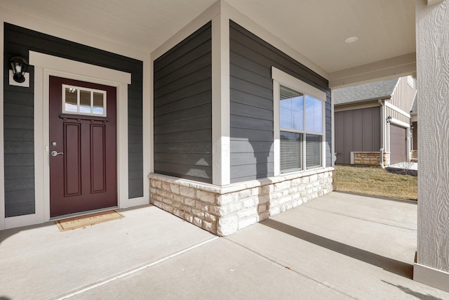 property entrance featuring covered porch