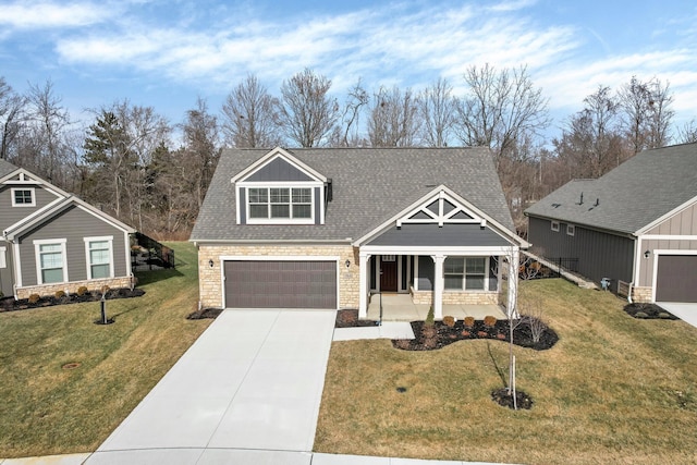 craftsman-style house with a garage, a front lawn, and a porch