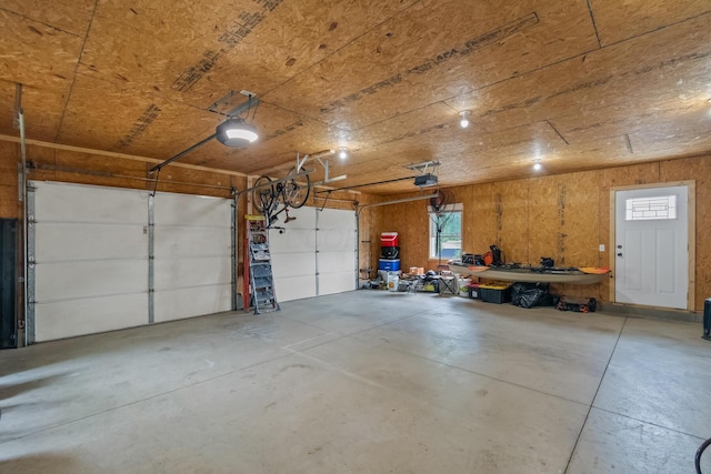 garage featuring a garage door opener