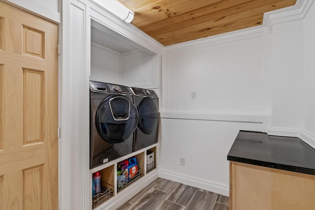 laundry area with separate washer and dryer, wooden ceiling, and dark hardwood / wood-style floors