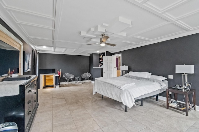 bedroom with ceiling fan and coffered ceiling