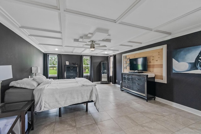 tiled bedroom with ornamental molding, ceiling fan, and coffered ceiling